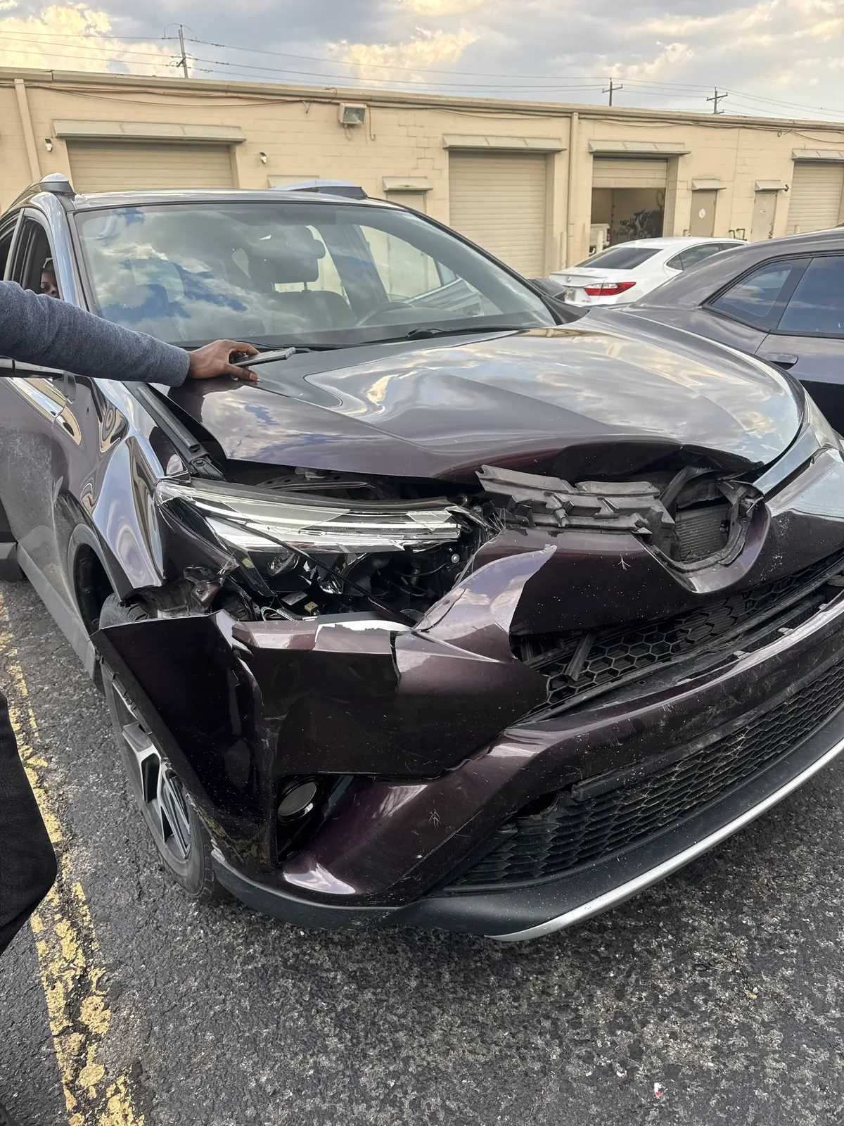 Front-end collision damage on a Toyota RAV4