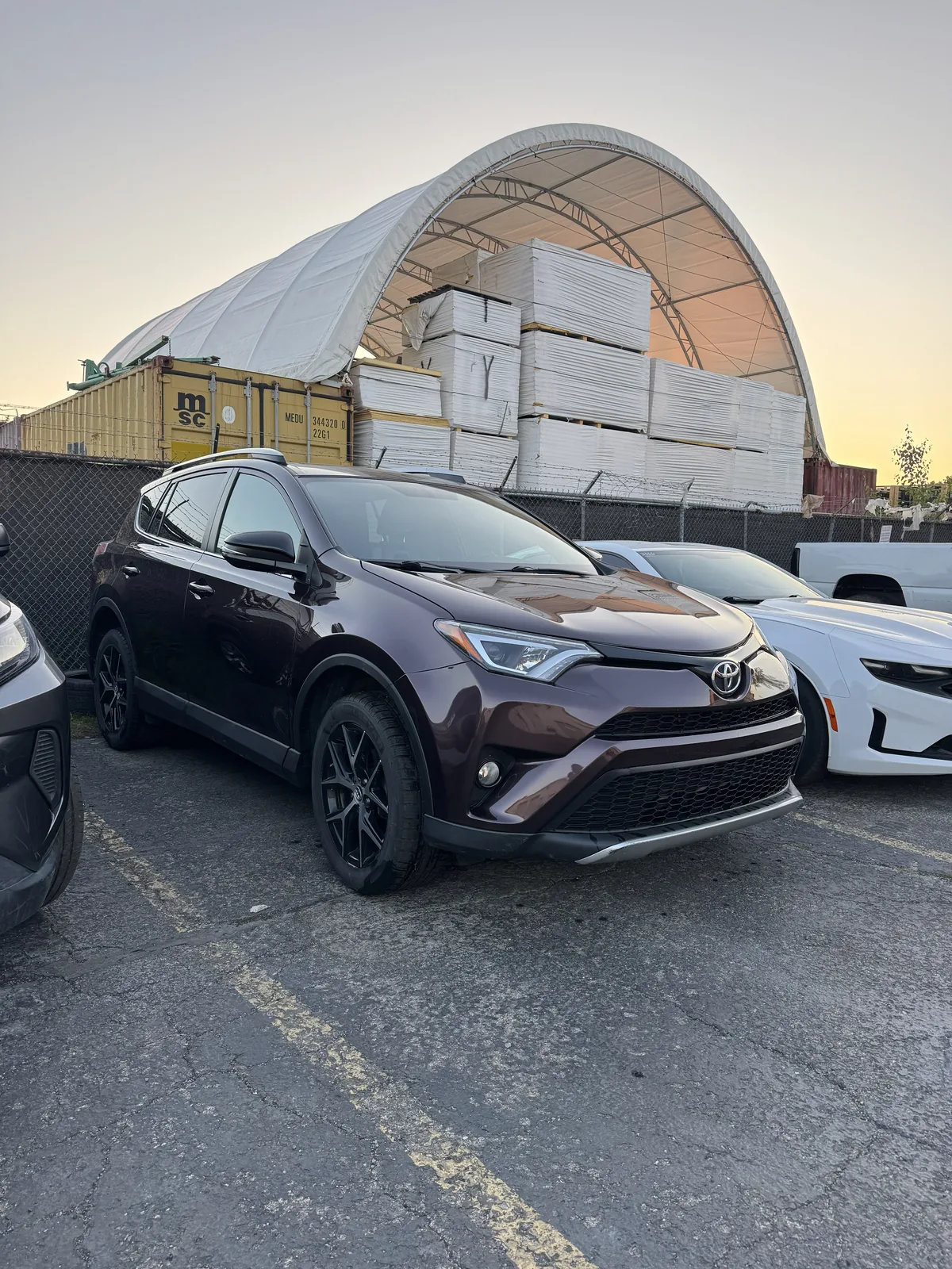 Finished Toyota RAV4 on the lot at sunset