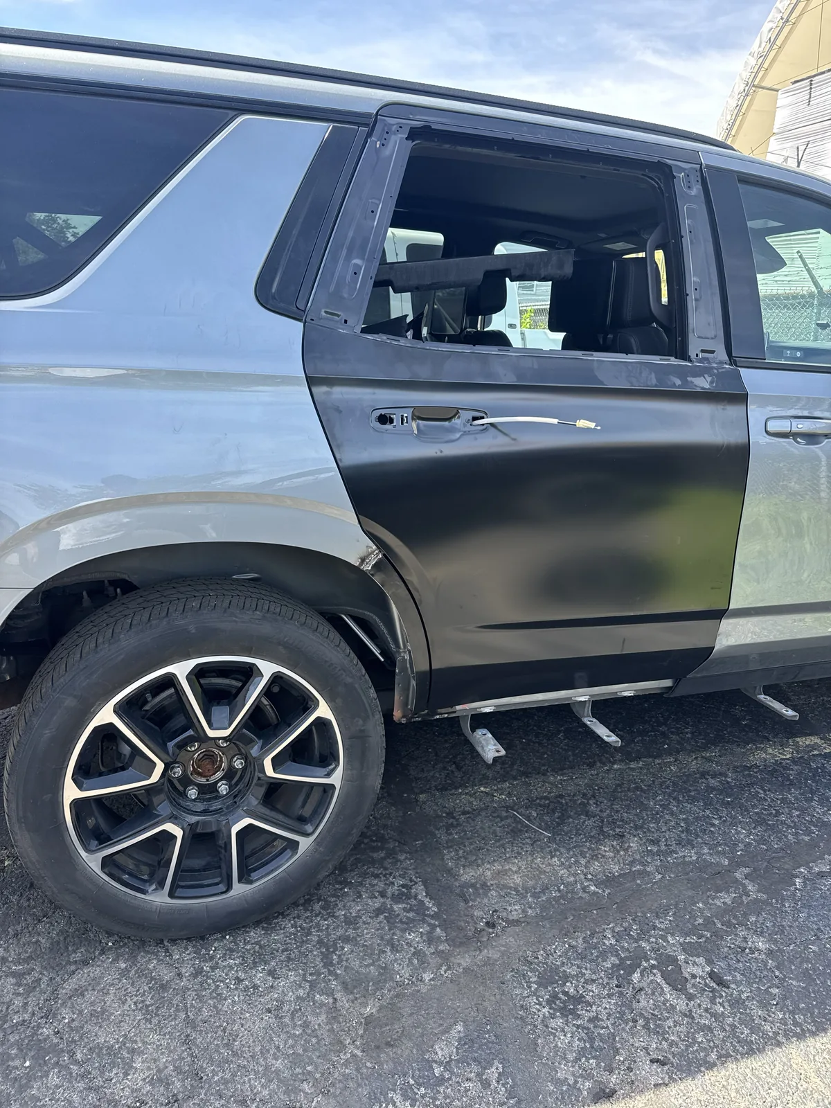 Honda Pilot with rear door and quarter panel stripped for repair