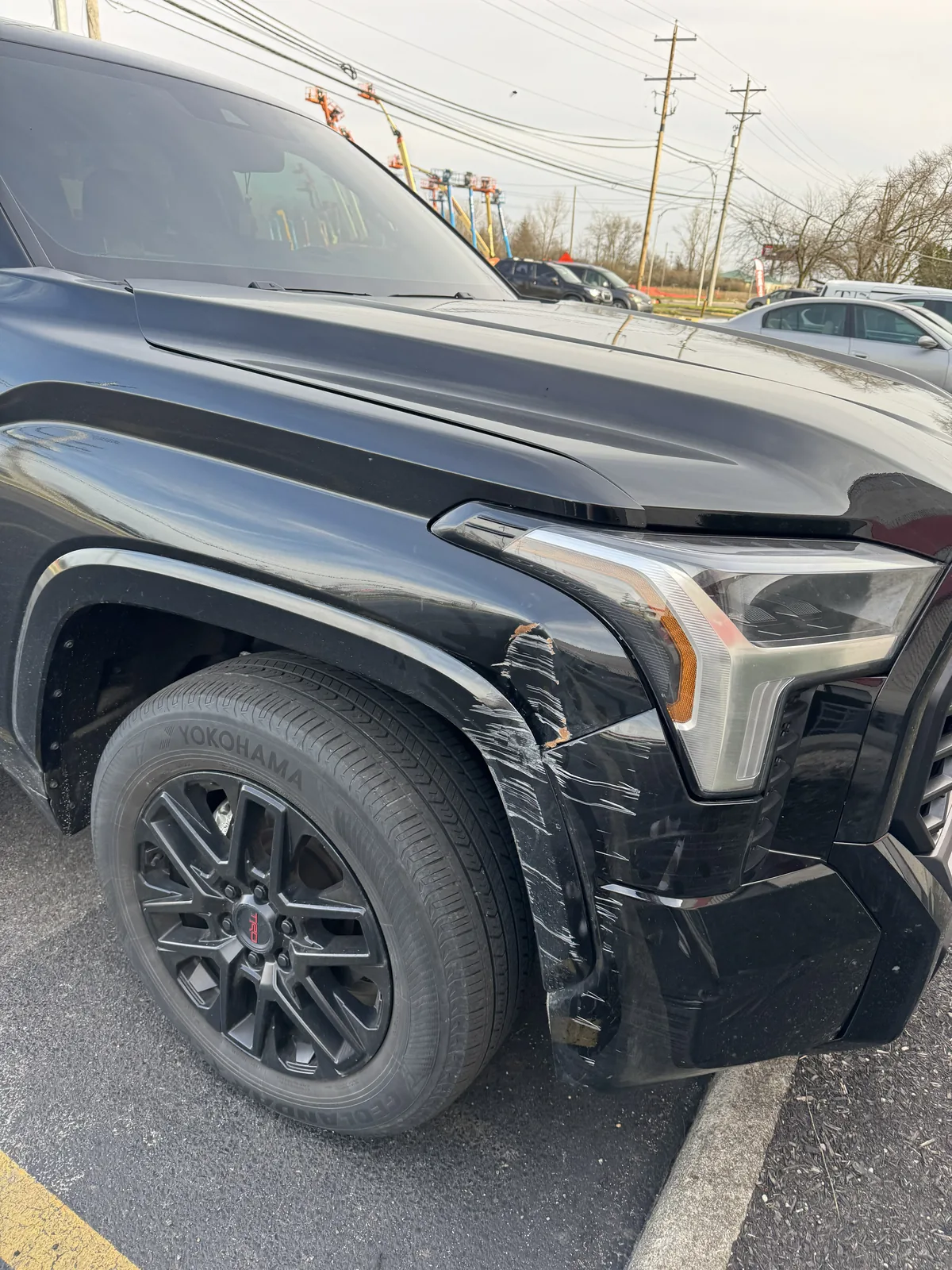 Black Toyota Tundra fender with paint scraped off